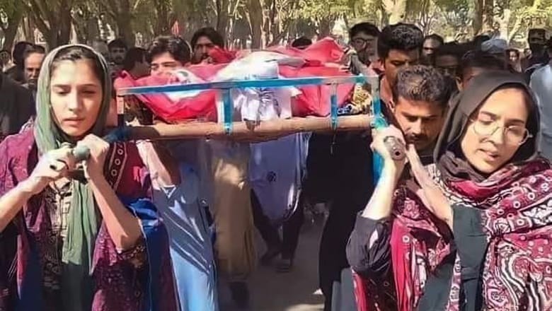 Daughters carry their father's body for burial in Nasirabad