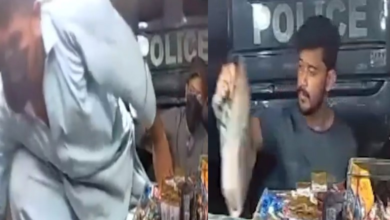 Robbers use police mobile to loot paan shop in karachi