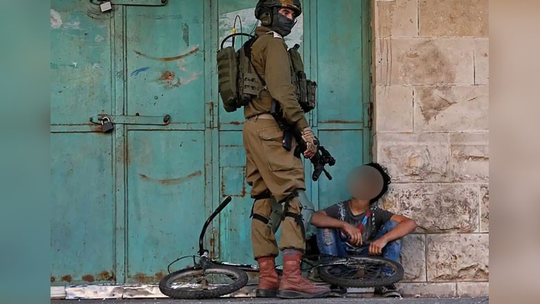 Israeli forces 'snatch' bicycle from Palestinian boy in West Bank