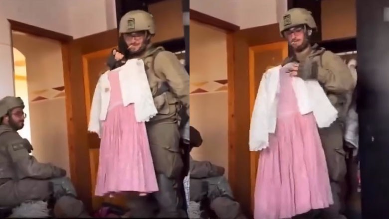 Israeli soldiers mock Palestinian children by playing with their clothes inside their homes in Gaza