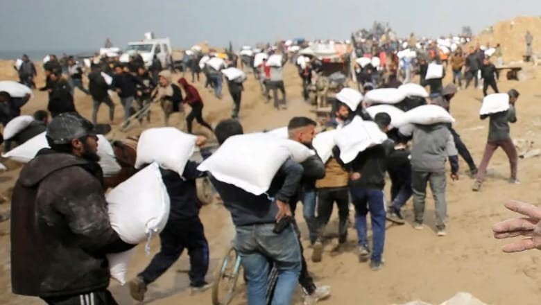 Israeli drone strikes kill 12 Palestinians waiting for aid in Gaza